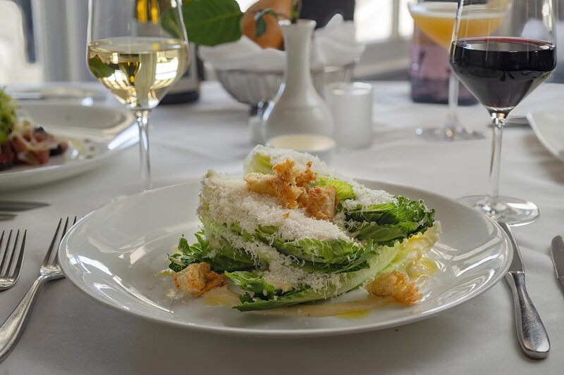 Baby Romaine Caesar Salad, Garlic Dressing, Tourn Croutons, Parmesan salad