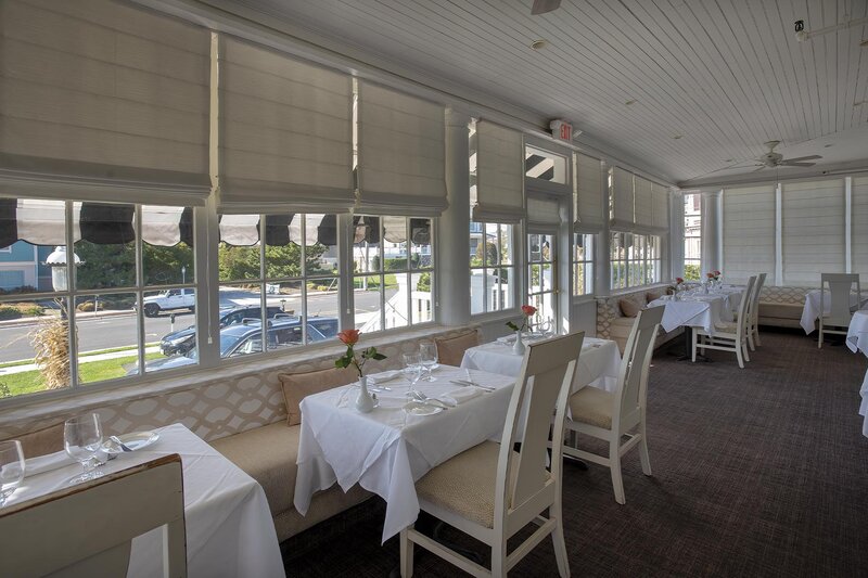 Patio room with many set tables