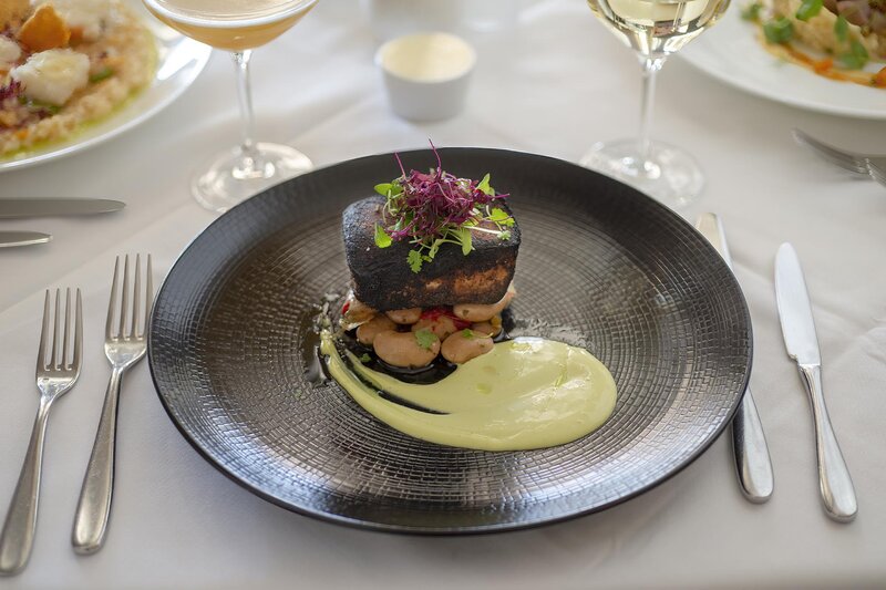 Blackened Bluefin Tuna, Crab, Gigante Bean Salad, Basil Aioli entree