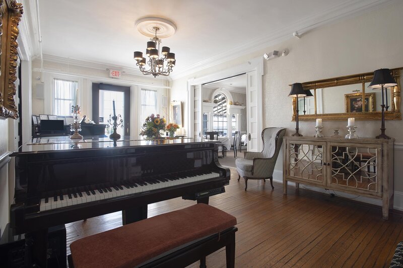 Waiting area with view of piano
